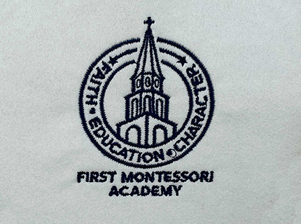 First Montessori logo